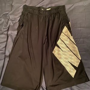 Black Nike shorts, medium